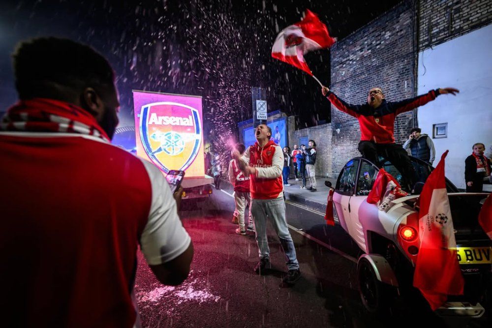 english_media_personality_and_former_arsenal_footballer_ian_wright_celebrates_with_supporters_at_3_-5f00c.jpg