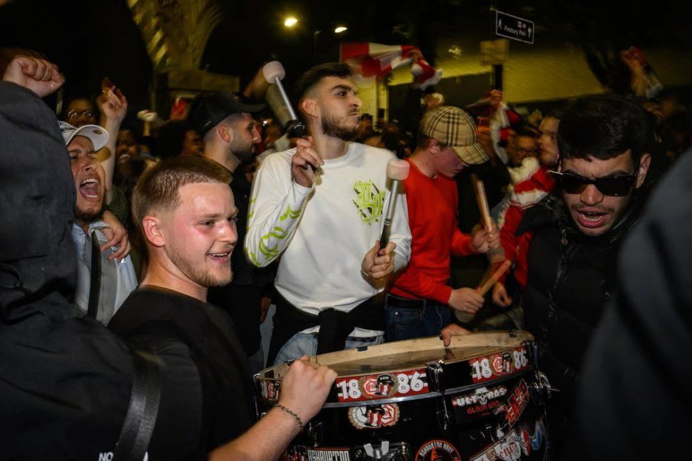 english_media_personality_and_former_arsenal_footballer_ian_wright_celebrates_with_supporters_at_5_-e557b.jpg