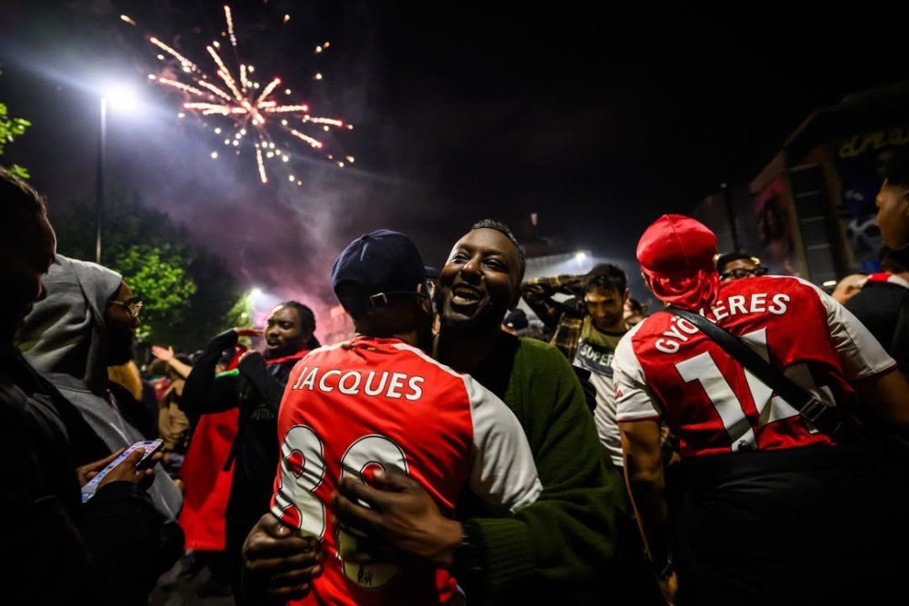 english_media_personality_and_former_arsenal_footballer_ian_wright_celebrates_with_supporters_at_8_-0468a.jpg