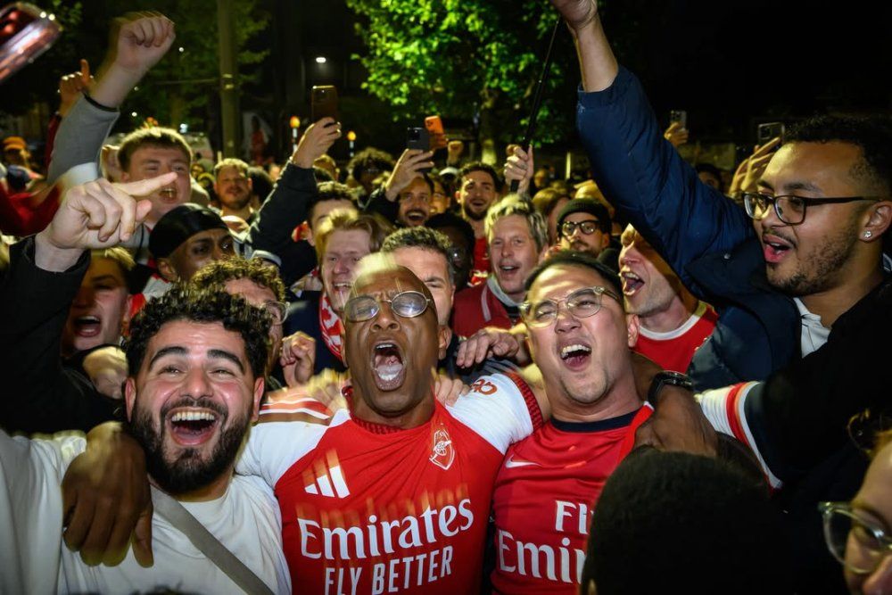 english_media_personality_and_former_arsenal_footballer_ian_wright_celebrates_with_supporters_at_9_-173a2.jpg